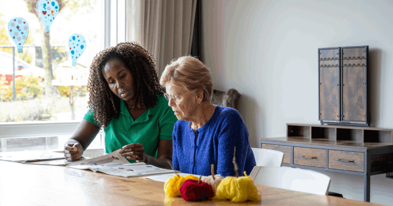 Woman taking care of another. Home care provided by Medicaid